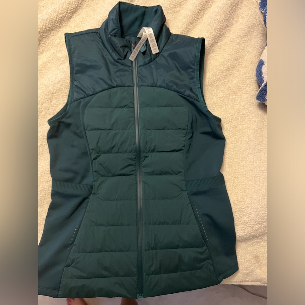 Lululemon vest. Size 10. Tags removed, but I never wore.